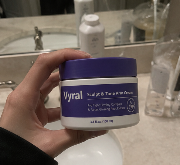 Collage of a person holding a jar of Vyral Sculpt & Tone Arm Cream in a bathroom setting.